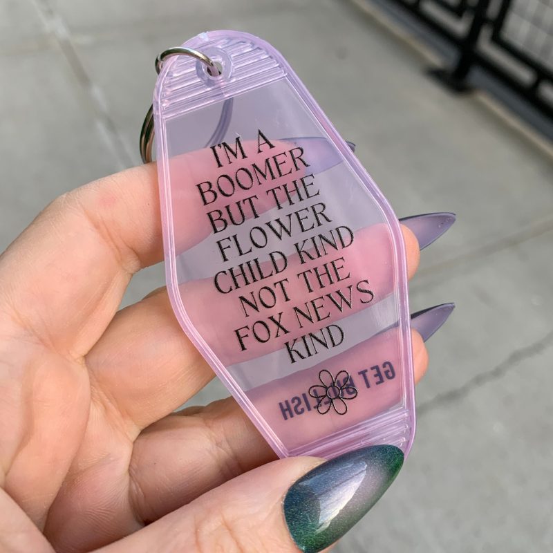 Im a Boomer But Not the Fox News Kind Motel Style Keychain in Translucent Pink 3